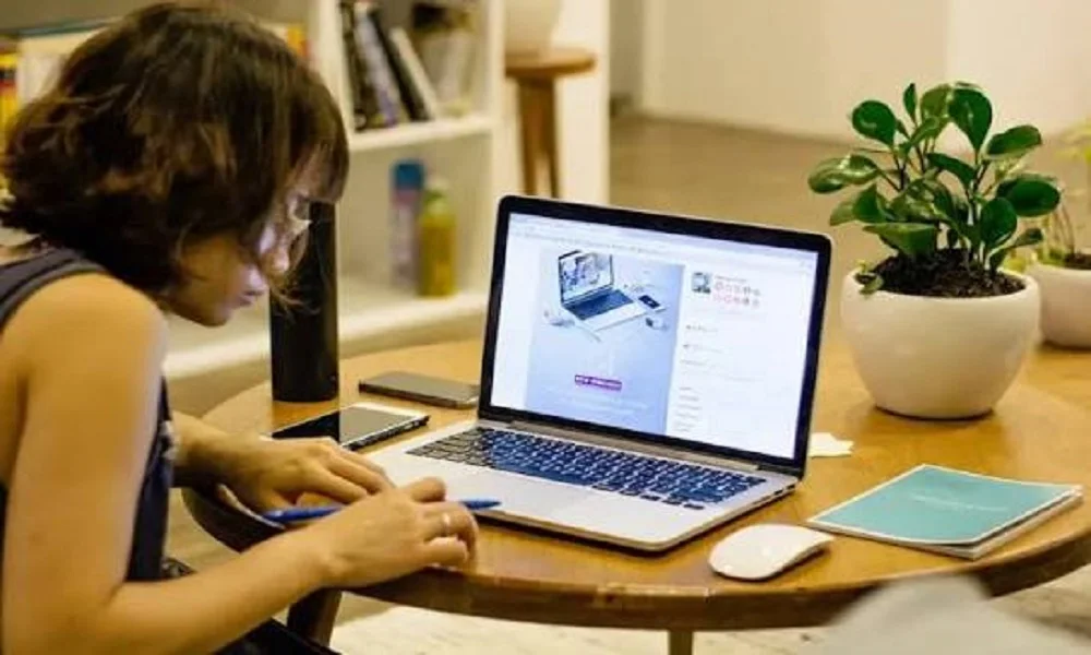 Freelancer working on a laptop at home